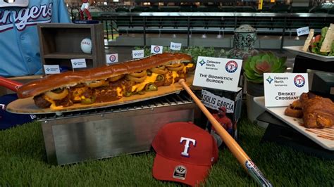 Nolan Ryan use to throw 100mph pitches at batters and now hes pitching 26 hot dogs for Texas Rangers fans. . Boomstick rangers